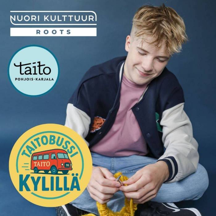 A young boy happily doing crochet